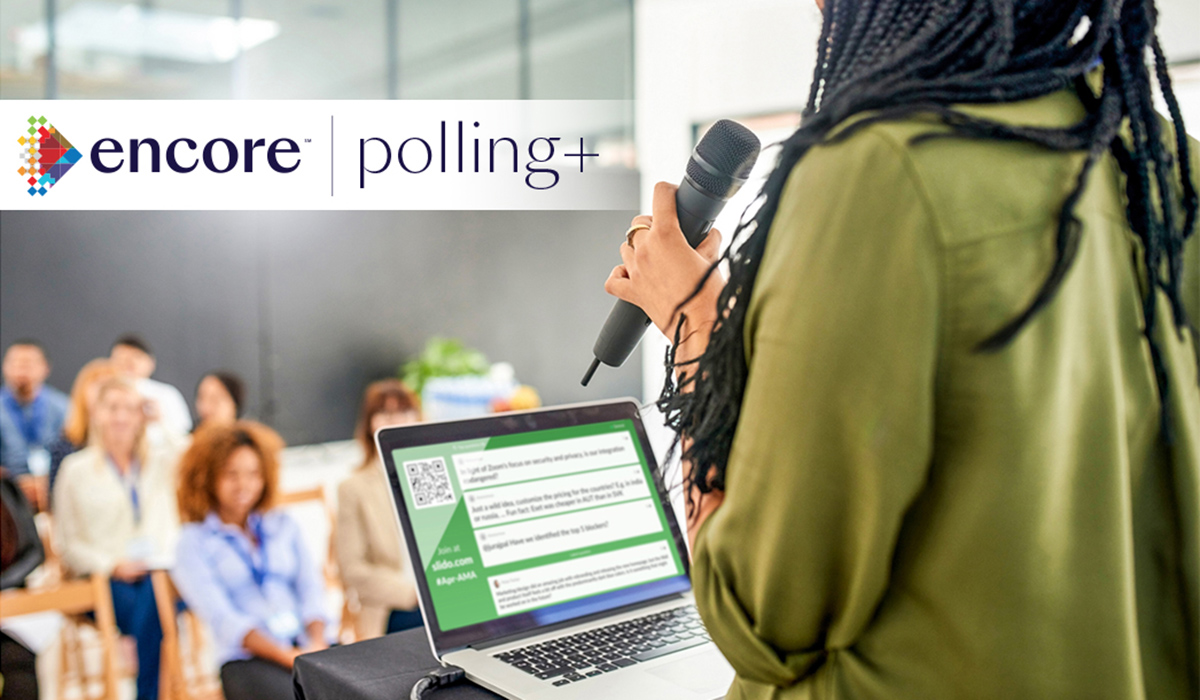 polling+ logo with presenter speaking into microphone